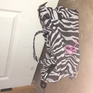 zebra bag with an “r” on it